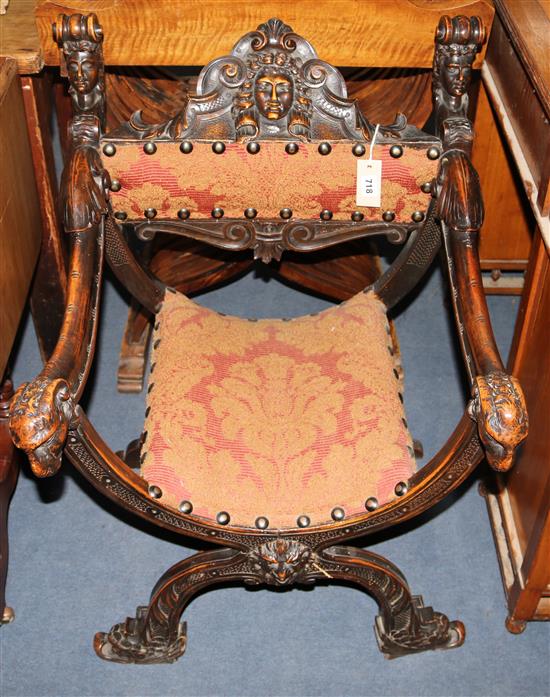 A 17th century style Italian carved walnut X frame chair